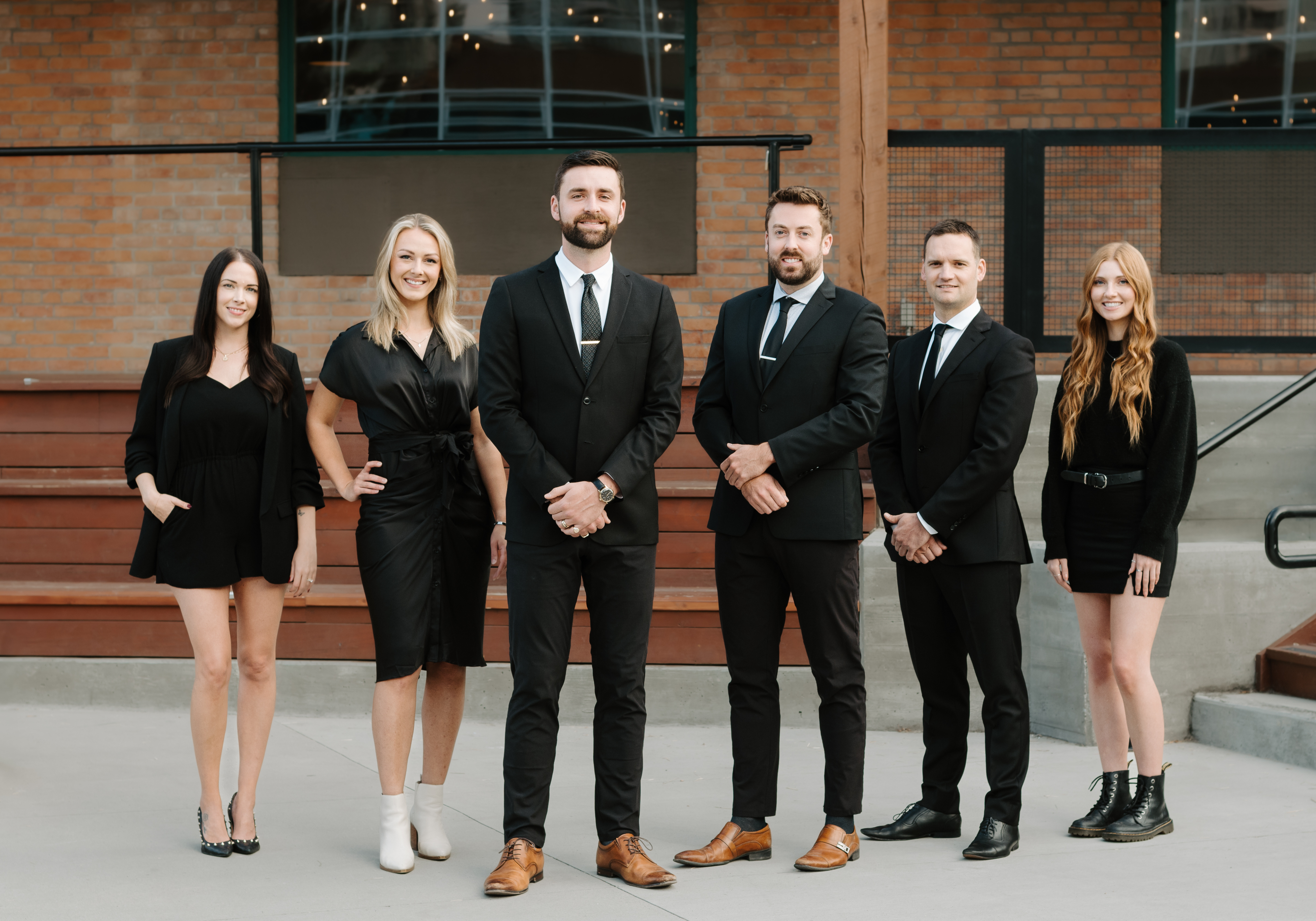 Scott Marshall Group, Okanagan Real Estate, standing outside of the Laurel Packing House in Kelowna.